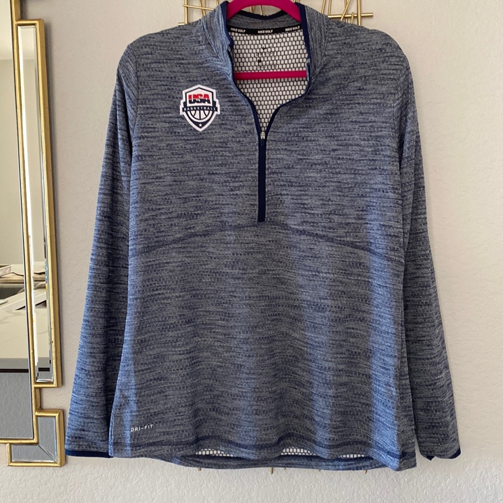 Never worn Nike zip up with Basketball logo..